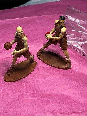 Vintage Brown Basketball Player Figures with Red-Accent Ball